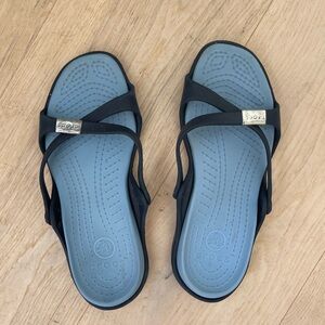 Crocs size 8 blue sandals.